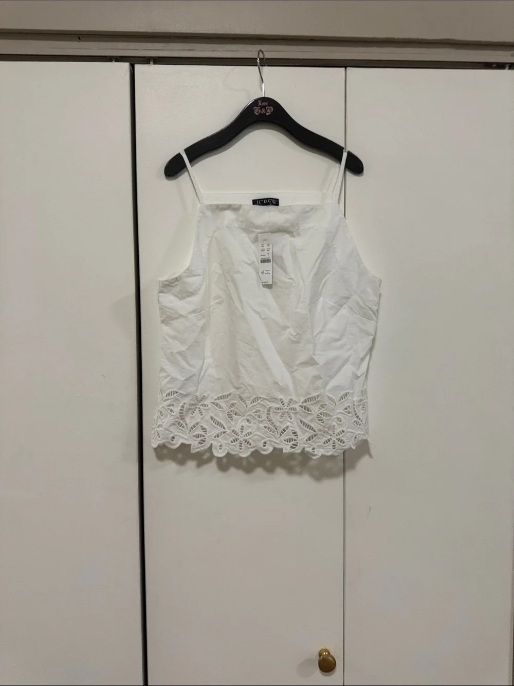 Embroidered high-neck top in cotton poplin